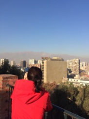 Jules finally getting a glimpse of the Andes from Santiago!