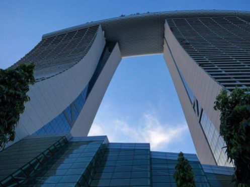 This is the Marine Bay Sands, a three tower hotel with an infinity pool on that banana shaped terrace (photo credits: Susan Selgren)